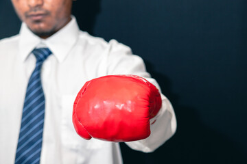 Concept of business competition Businessman standing in red boxing gloves, success in uncle...