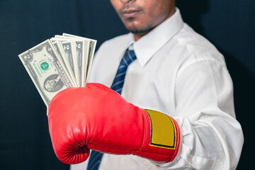 Concept of business competition Businessman standing in red boxing gloves, success in uncle...