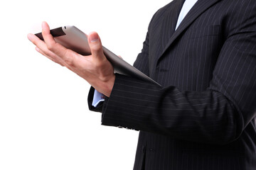 Businessman working on digital tablet