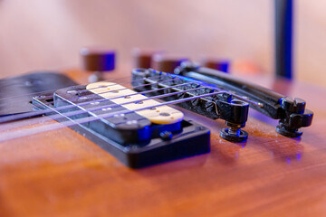 Elements and parts of the electric guitar close-up. Macro. Soft Focus