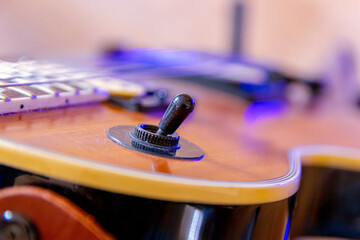 Obraz na płótnie Canvas Elements and parts of the electric guitar close-up. Macro. Soft Focus