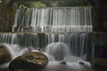 Fototapeta premium Waterfall in the Serra dos Órgãos, in Teresópolis, Rio de Janeiro. Photographed with long exposure