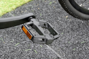 A foot pedal white reflective light on the bike,Safety on the road   