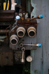 Rusted knobs on outdated equipment