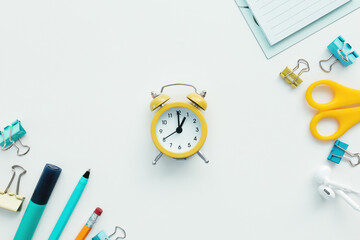 Paper clip, clock, pen, scissors on white background. Work and education concept