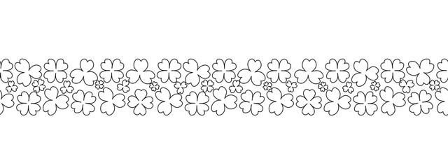 Clover. Sketch. Seamless horizontal border. Trefoil and four-leafed. Repeating vector pattern. Saint Patrick Day. A leaf that brings good luck. Isolated colorless background. Doodle style. 