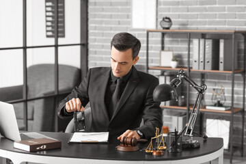 Male judge working in office