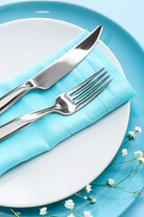 Beautiful table setting on color background