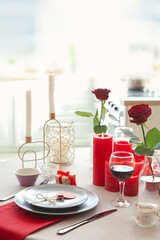 Festive table setting for Valentines Day celebration at home