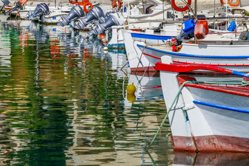 Fototapeta na wymiar Boats in Nea Chora Harbour Chania Crete Greece