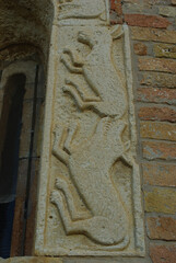Moscufo - Abruzzo - Abbey of Santa Maria del Lago - Details of some flat relief decorations of the external single lancet windows