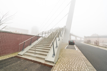 Concrete stairway with fog