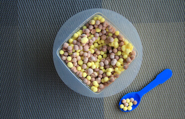 Delicious ice cream consisting of small colorful balls