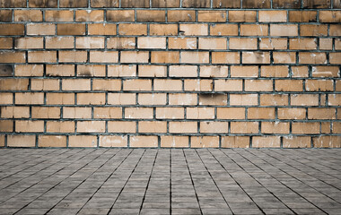 Empty room with bricks wall and tiled floor.