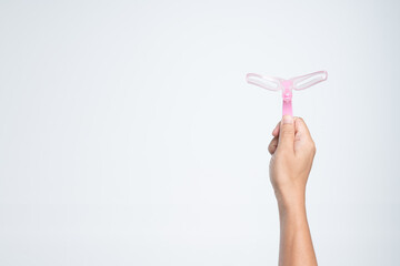 Hand holding Adjustable eyebrow balance ruler