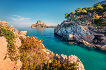 Fototapeta premium Beautiful spring scenery. Adorable summer view of Santa Elia cape with Zafferano mountain on background. Tranquil water bay on Sicily, Palermo city location, Italy, Europe.