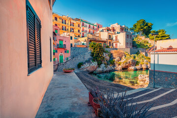 Сharm of the ancient cities of Europe. Sunny spring cityscape of Sant' Elia village. Bright...
