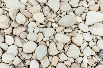 view from above on white pebbles