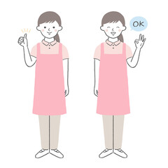 OKポーズの介護ヘルパー／保育士　女性