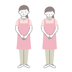 お辞儀をする介護ヘルパー／保育士　女性