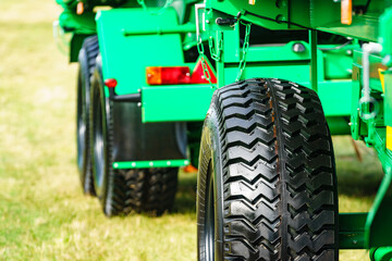 Wheel and tyre at agricultural machine.
