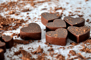 Chocolate in hearts forms with cacao decoration
