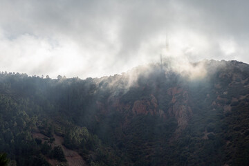 Clouds rolling over the mountains of Le Dramont in the Massif de L'Estérel in south France 