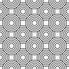 Abstract seamless pattern. Concentric circles. Intersecting repeating circles background. Overlaping circles. Stylish texture. Repeating geometric tiles. Flat design. Vector monochrome background.