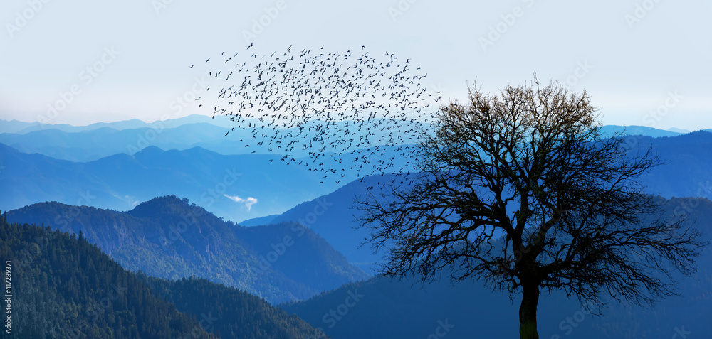 Poster lone dead tree with super full blue moon -