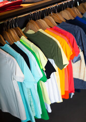 Close up of male shirts on hangers in clothing store
