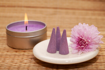 Obraz na płótnie Canvas indian natural ingredients with flower, candle, and Aromatherapy Bath accessories