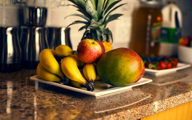Collection of fruit on a kitchen counter