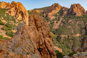 Aerial shots of the red mountains of the Massif de L'essterel in France..