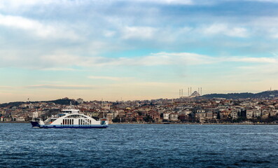 Fototapeta premium Cruise ferries in Bosphorus between european and asian coasts of Istanbul. Turkey.