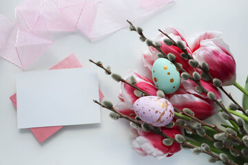 springtime. easter greeting card with easter eggs, flowers and willow twigs  © Palanga