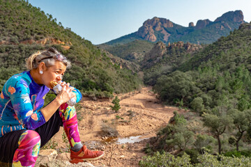 Stopping for a picnic while hiking the Massif de l'Esterel at le Dramont in the south of France