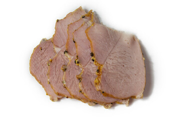 Appetizing baked sliced meat isolated on white background close-up