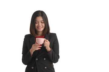 Asian business woman is holding a cup of coffee and looking it. On white Background.