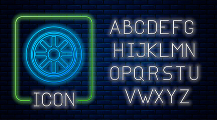 Glowing neon Car wheel icon isolated on brick wall background. Neon light alphabet. Vector.