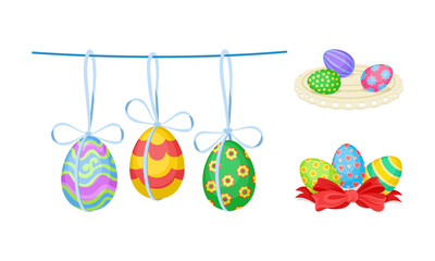 Decorated Easter Egg Hanging on Rope Tied with Ribbon and Rested on Table Napkin as Holiday Symbols Vector Set