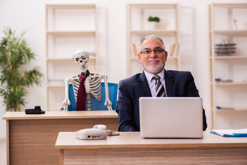 Dead employee working in the office