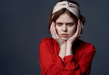 elegant woman emotions red dress studio closeup model