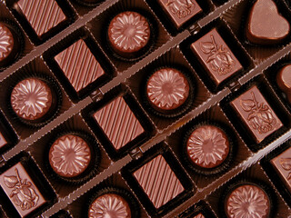 Chocolates top view. Macro shot of milk chocolate
