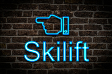 Fototapeta premium Leuchtreklame Skilift