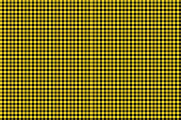 A tartan plaid pattern (a cloth consisting of criss-crossed, horizontal and vertical bands). Black and gold color tones.
