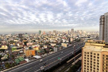 Fototapeta na wymiar Manila cityscape view from Makati city, Metro Manila, Philippines, Feb 2, 2021