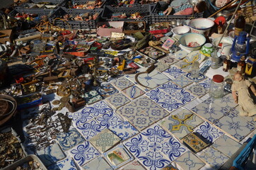 Fototapeta na wymiar A vintage stall at a flea market at Alfama district in Lisbon, Portugal.
