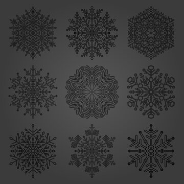 Set of snowflakes. Black winter ornaments. Snowflakes collection. Snowflakes for backgrounds and designs