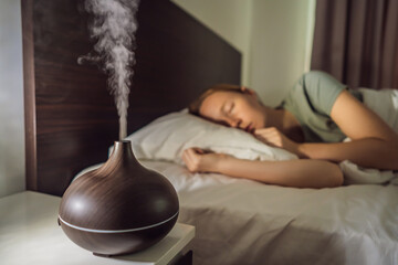 Aromatherapy Concept. Wooden Electric Ultrasonic Essential Oil Aroma Diffuser and Humidifier....