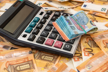 euro cash and calculator as finance background